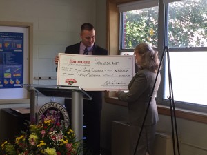 Hannaford Supermarkets Regional Community Relations Specialist Brian Fabre (left) presents The Sage Colleges President Susan C. Scrimshaw with a $50,000 donation to support the newly renovated Nutrition and Physical Assessment Laboratory
