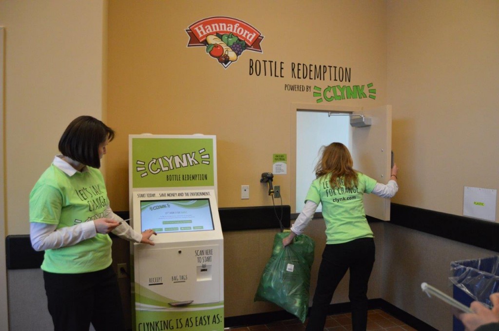 CLYNK ambassadors demonstrate how to use the new bottle redemption service.