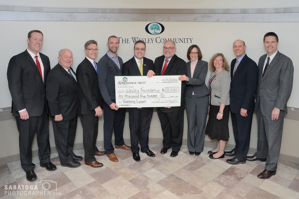 Pictured (L to R) are Greg Dixon, Executive Director of The Wesley Foundation; Philip W. Klein, Vice President of The Adirondack Trust Company and Board President of the Wesley Foundation; Stephan von Schenk, President of The Adirondack Trust Company; Timothy Busch, Gala Co-Chair and Wesley Foundation Board member; Charles V. Wait Jr., Executive Vice President of The Adirondack Trust Company; Brian Nealon, CEO of The Wesley Community; Joanne Kirkpatrick, Gala Co-Chair and Wesley Foundation Board member; Alicia Butler, Assistant Treasurer at The Adirondack Trust Company and Board member of The Wesley Foundation; Dutch Hayward, Administrator at Wesley Health Care Center; and Andrew Wise, Vice President of The Adirondack Trust Company and UMHH Board Member.