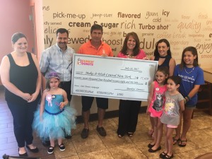 From left to right: Ashland Winship; Central New York Wish Kid Lilianah Winship; Wolak Group Chief of Staff Bob Alberti; Dunkin’ Donuts Franchisee Tom Santurri; President and CEO of Make-A-Wish Central New York Diane Kuppermann; Adrianna Quig; Autumn Winship; Madison Winship and Lexi Glenny.