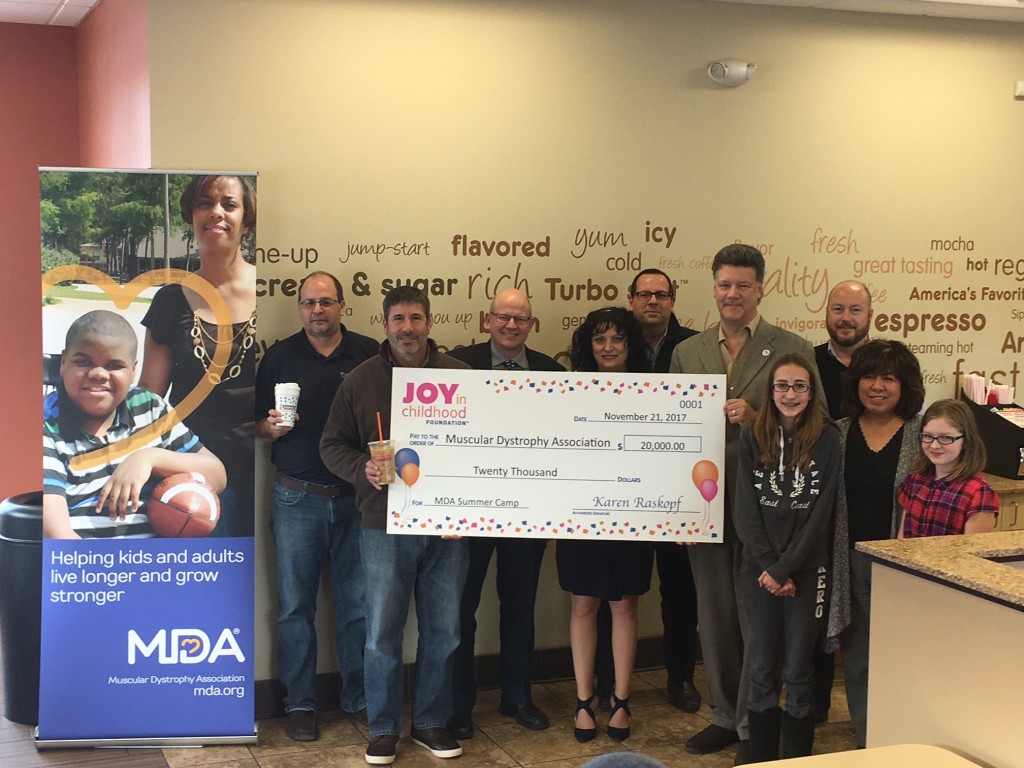 From left to right: Wolak Group Director of Innovations Guy Ruffo; Dunkin’ Donuts Franchisee Tom Santurri; Dunkin’ Donuts Field Marketing Manager Eric Stensland; Muscular Dystrophy Association Fundraising Coordinator Karen Fink; Wolak Group Director of Operations Greg Constantino; Muscular Dystrophy Association Executive Director Tony Ortega; Muscular Dystrophy Association Summer Camper Courtney Perrin; Dunkin’ Brands Operations Manager Wes Hurwitz; Muscular Dystrophy Association Family Care Specialist Tess Oliver; and Muscular Dystrophy Association Summer Camper Payton Near. 