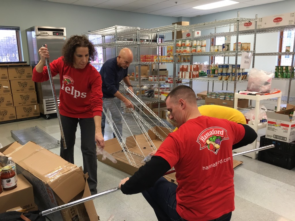 Hannaford Supermarkets Community Relations Specialist Brian Fabre (front right) and Community Relations Assistant Francesca Mancino (front left) are joined by volunteers from The Food Pantries for the Capital District.