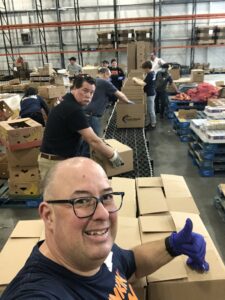 Dunkin’ and the Joy in Childhood Foundation celebrate 10 years of volunteering and supporting hunger relief during their annual volunteer event. Dunkin’ franchisees and crew members teamed up with the Food Bank on Tuesday, April 9 to pack 230 boxes of food, equivalent to 4,792 meals.