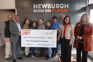Dunkin’ and Baskin-Robbins franchise network, Ganpati Donuts, in conjunction with the Dunkin’ Joy in Childhood Foundation presented Food Bank of Hudson Valley with a $3,500 donation to celebrate the newly remodeled restaurant at 674 Broadway in Newburgh. From left to right: Children’s Programs Coordinator for Food Bank of Hudson Valley Troy Martin, Ganpati Donuts Franchisee Amish Patel, Ganpati Donuts Newburgh Store Manager Michelle Leandro, Manager with Ganpati Donuts Theresa Lucero, Director of Operations for Ganpati Donuts Jessica Shue, Manager with Ganpati Donuts Miriam Leandro, Manager with Ganpati Donuts Waleska Ortiz, Ganpati Donuts Franchisee Ami Patel, Director of Community and Corporate Development for Food Bank of Hudson Valley Sara Gunn.