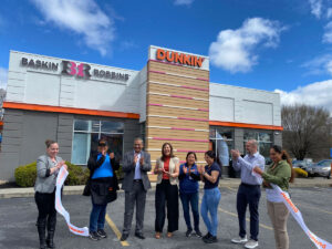 Representatives from Ganpati Donuts celebrate the grand reopening of their newly remodeled Dunkin’ and Baskin-Robbins restaurant at 674 Broadway in Newburgh with a ceremonial ribbon-cutting. From left to right: Director of Operations for Ganpati Donuts Jessica Shue, Manager with Ganpati Donuts Waleska Ortiz, Ganpati Donuts Franchisee Amish Patel, Ganpati Donuts Franchisee Ami Patel, Manager with Ganpati Donuts Theresa Lucero, Manager with Ganpati Donuts Miriam Leandro, Dunkin’ Business Consultant Jordan Catala, Ganpati Donuts Newburgh Store Manager Michelle Leandro.