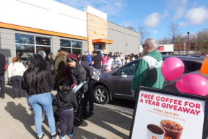 Guests line up for the Free Coffee for a Year giveaway at the newly remodeled Dunkin’ and Baskin-Robbins at 674 Broadway.